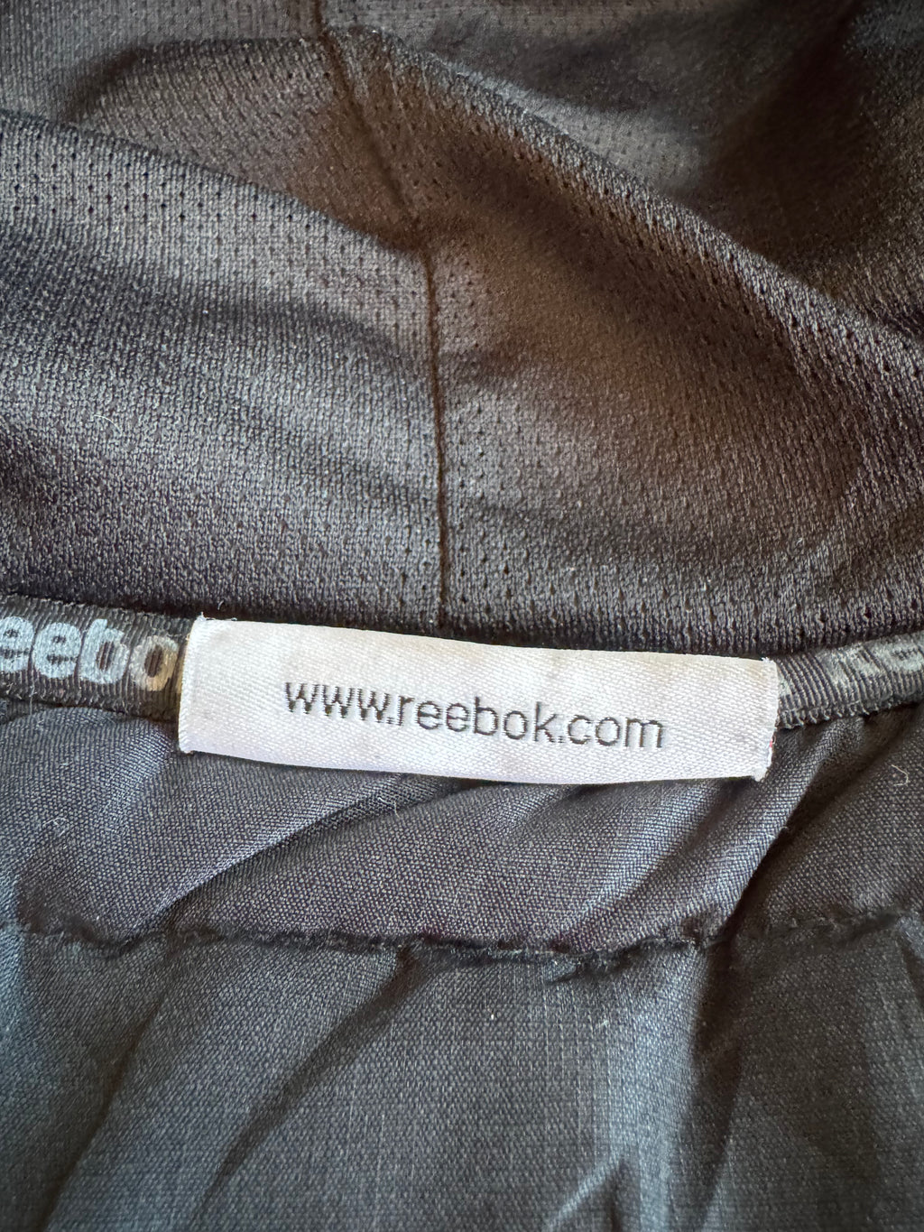 Giacca Reebok con Cappuccio e Dettagli Trapuntati